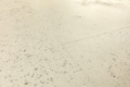 Panel winylowy Quick-Step Illume AVMTU40276 — Beton pebble - detal struktury producenta 2